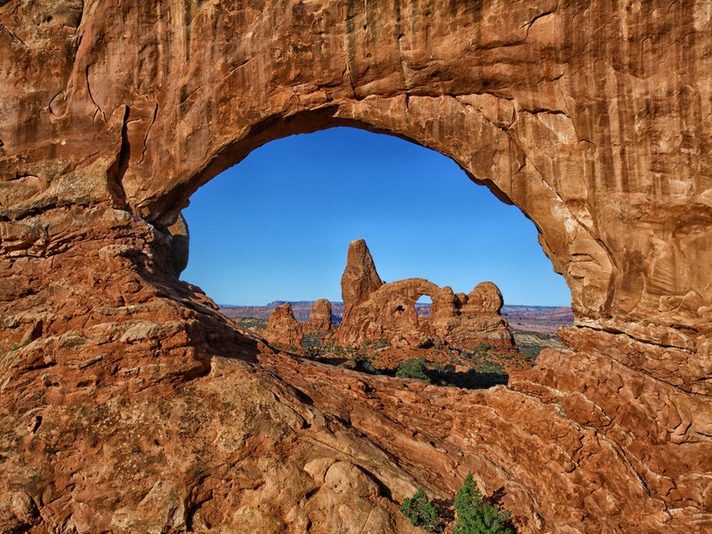 Desert sandstone Arch through a Window